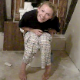 A girl sneaks into a bathroom to record her friend pooping, who denies actually pooping. The girl video-recording comments on the smell of curdled cheese and tries to push the pooping girl off of the toilet to get a shot of her stinky turd in the toilet.
